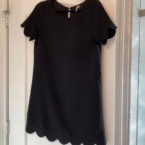 Black short sleeved scallop mini dress